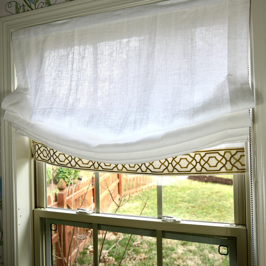 Relaxed White Linen Roman Shade with Decorative Trim, Ribbon Edge Blind